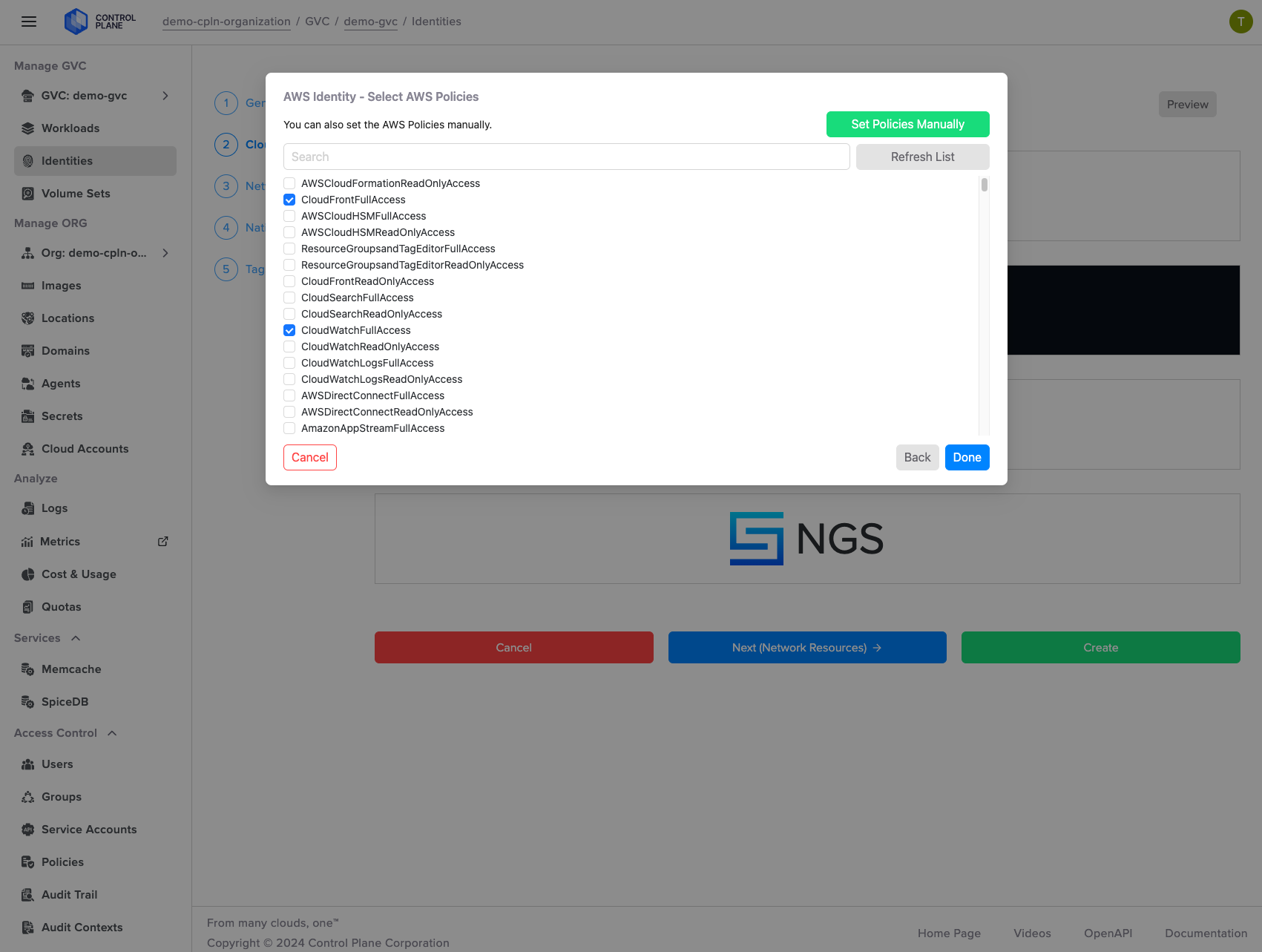 Screenshot shows manual selection of existing IAM policies, with an option to choose specific IAM roles, for DynamoDB tables.